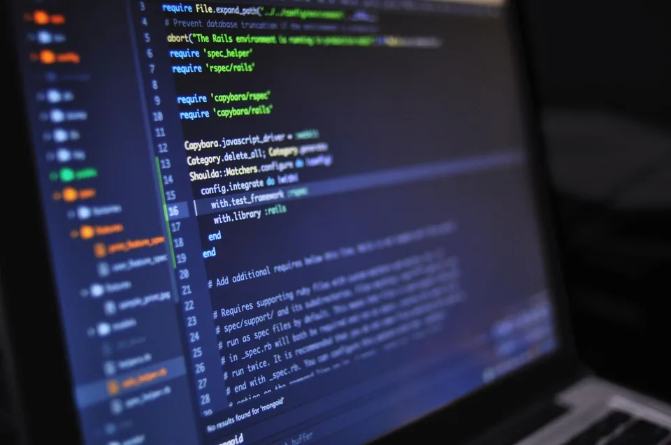 Software code on a screen; editorial photograph